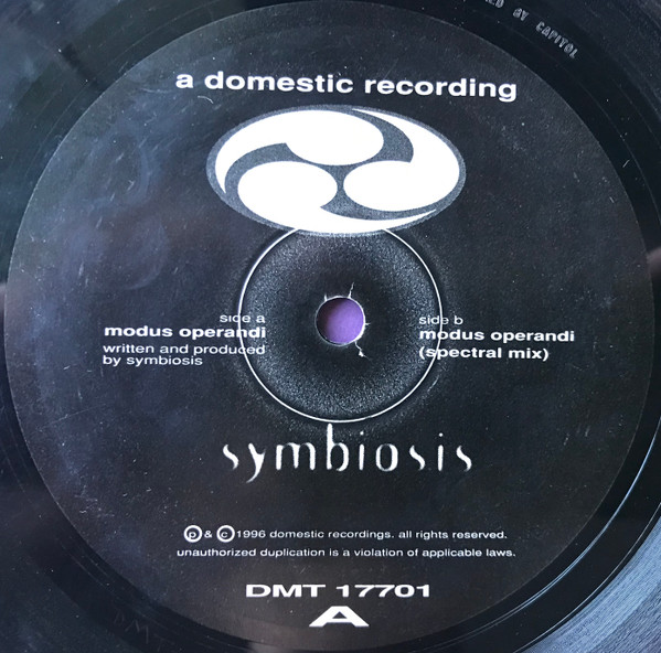 Symbiosis - Modus Operandi | Domestic (DMT 17701) - 2
