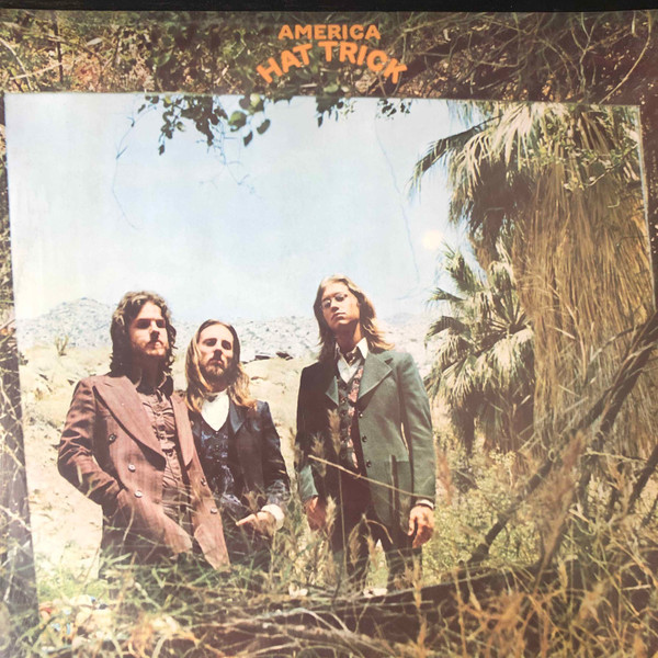 America - Hat Trick | Warner Bros. Records (W 56016)