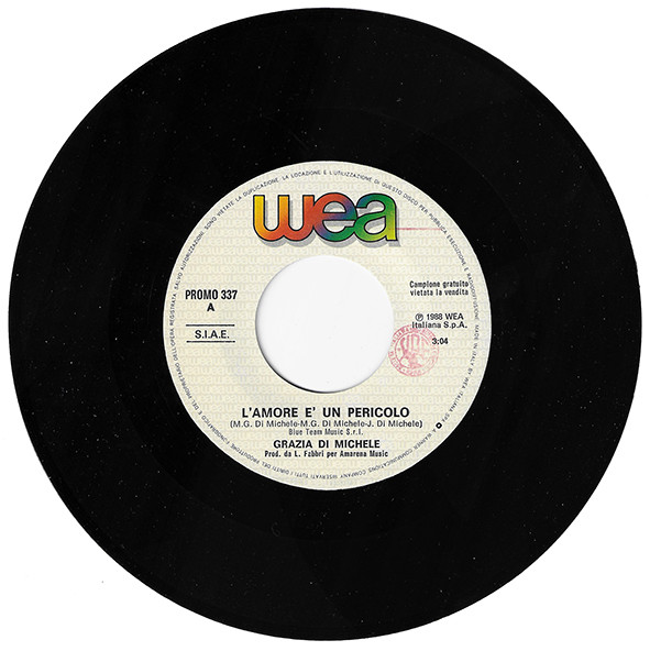 Grazia Di Michele - L'Amore E' Un Pericolo / Il Segreto | WEA (PROMO 337)
