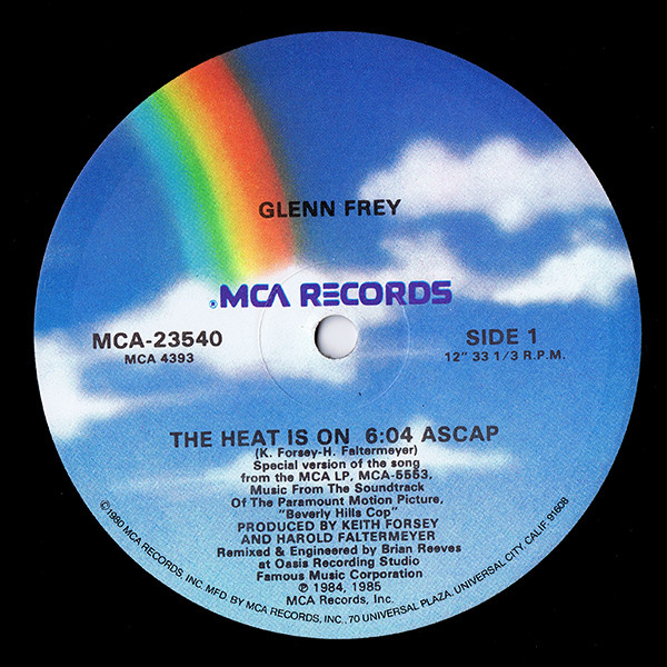 Glenn Frey - The Heat Is On | MCA Records (MCA-23540) - main Glenn Frey - The Heat Is On | MCA Records (MCA-23540) - main