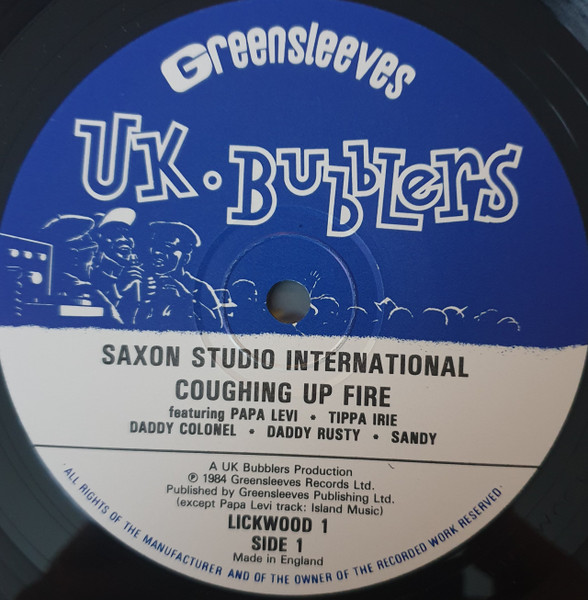 Saxon Studio International Coughing Up Fire
